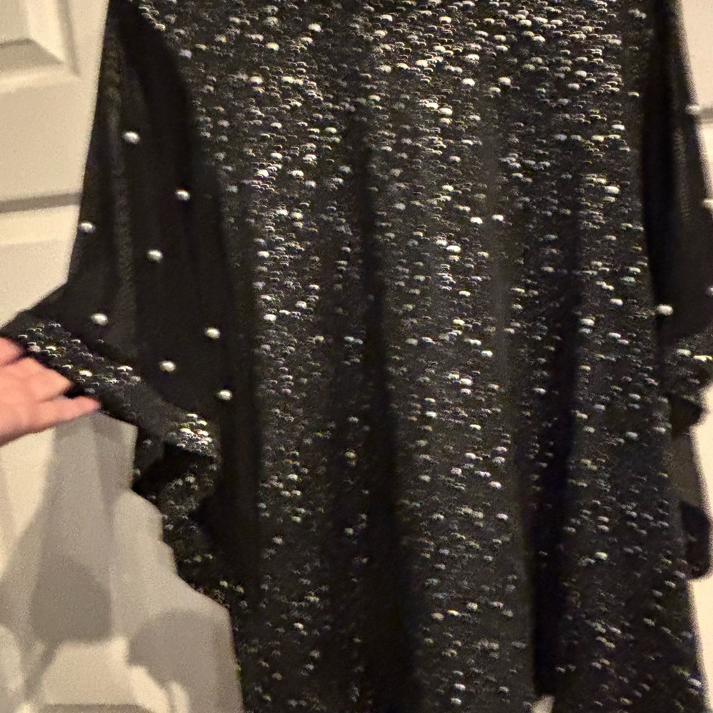 Black and Silver blouse with butterfly pearl embellished sleeves.